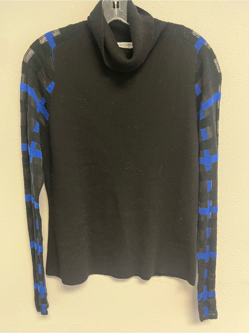 Black Turtleneck Sweater with Royal Blue Sleeve Pattern
